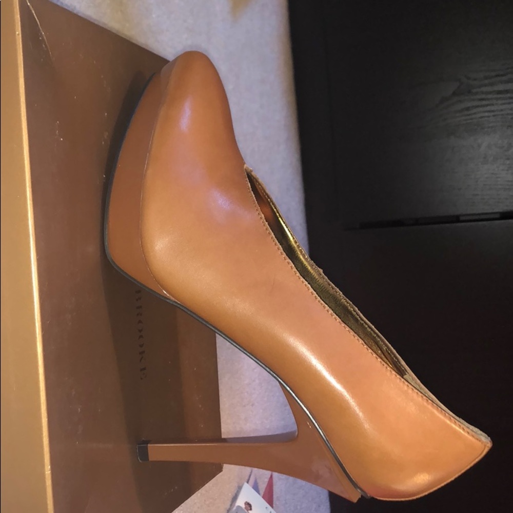 High heeled brown leather shoes